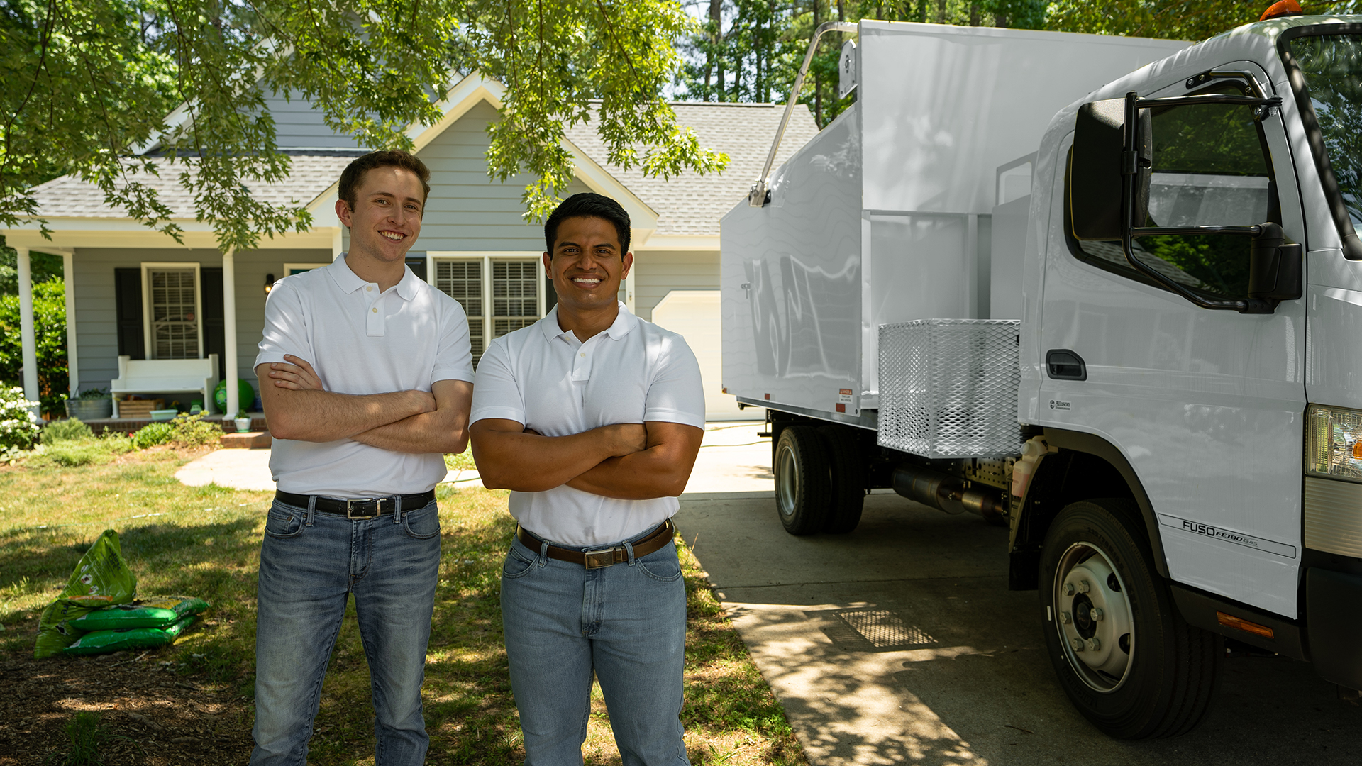 Riteway Services experts posing with smiles before performing same day junk removal services