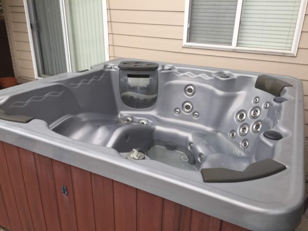 Empty hot tub in need of hot tub removal services